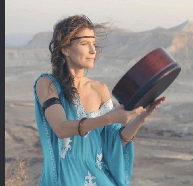 Invited artist Marla Leigh playing a frame drum